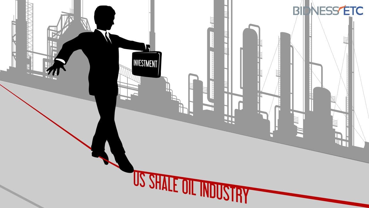 A businessman walking a tightrope labeled 'US Shale Oil Industry' while holding a briefcase labeled 'Investment', with oil rigs in the background