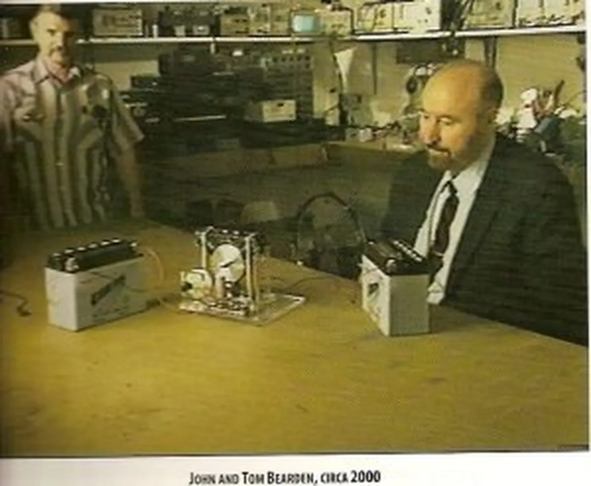 John Bearden and Tom Bearden working on a Tesla-related project in a lab setting, circa 2000